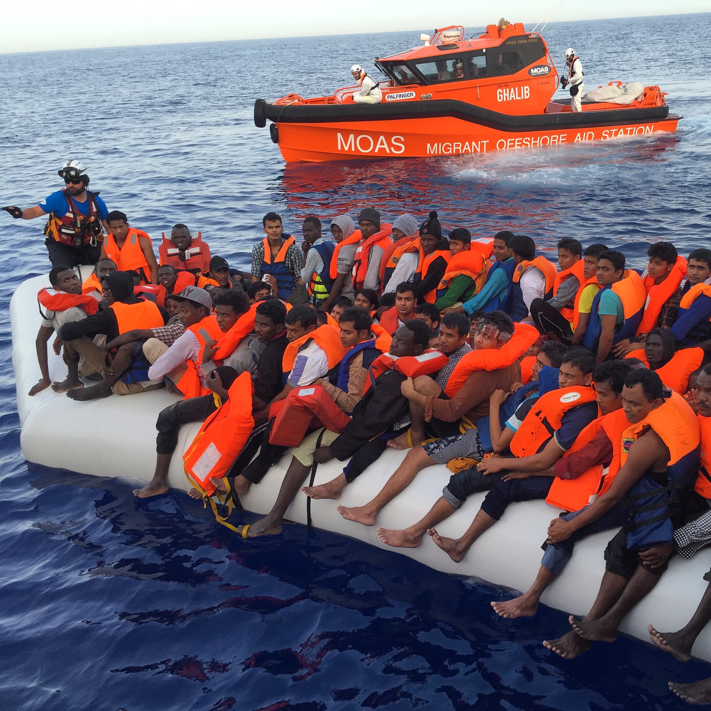 The team from MOAS gets ready to rescue migrants who set sail from Libya on a rubber dinghy.